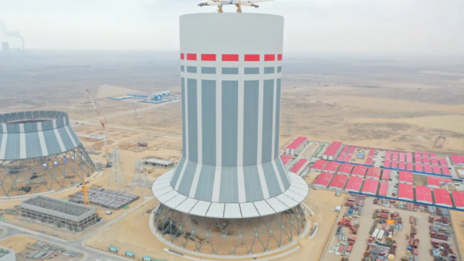 世界最大全國首個百萬機組全鋼結(jié)構(gòu)冷卻塔順利結(jié)頂